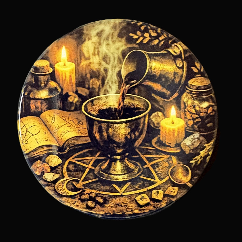 Decorative plate with a mystical design featuring a cup, candles, and books on a dark background.