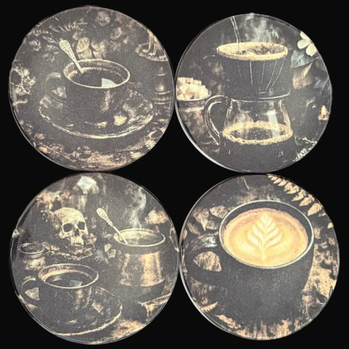 Four coasters with coffee-themed designs on a dark background