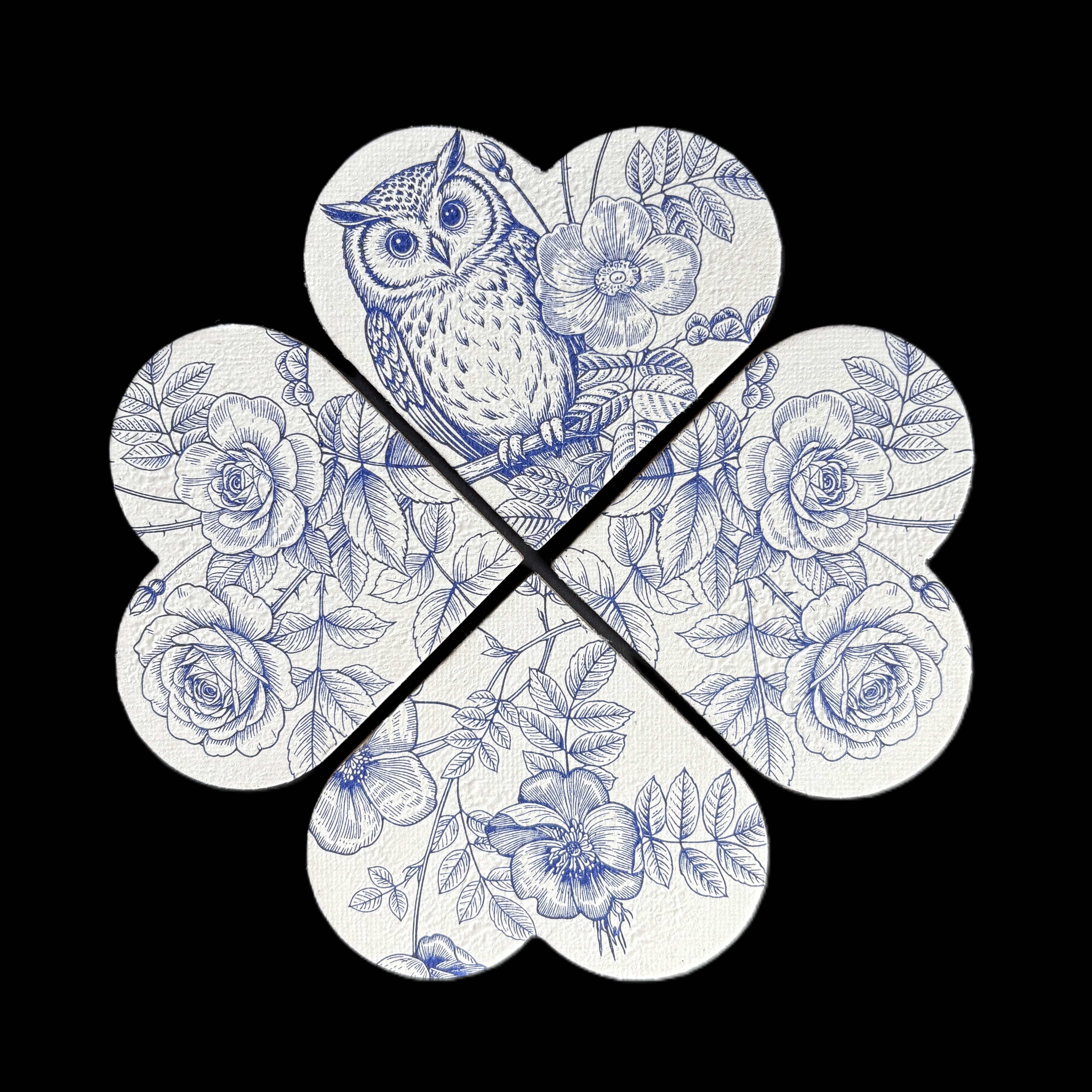 Four interlocking clover-shaped magnets with a blue floral and owl pattern on a white background, set against a solid black backdrop.
