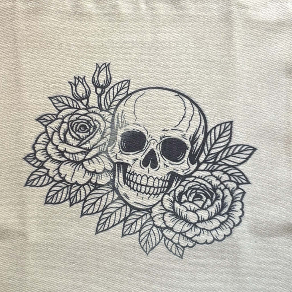 Skull and roses design on a textured fabric background