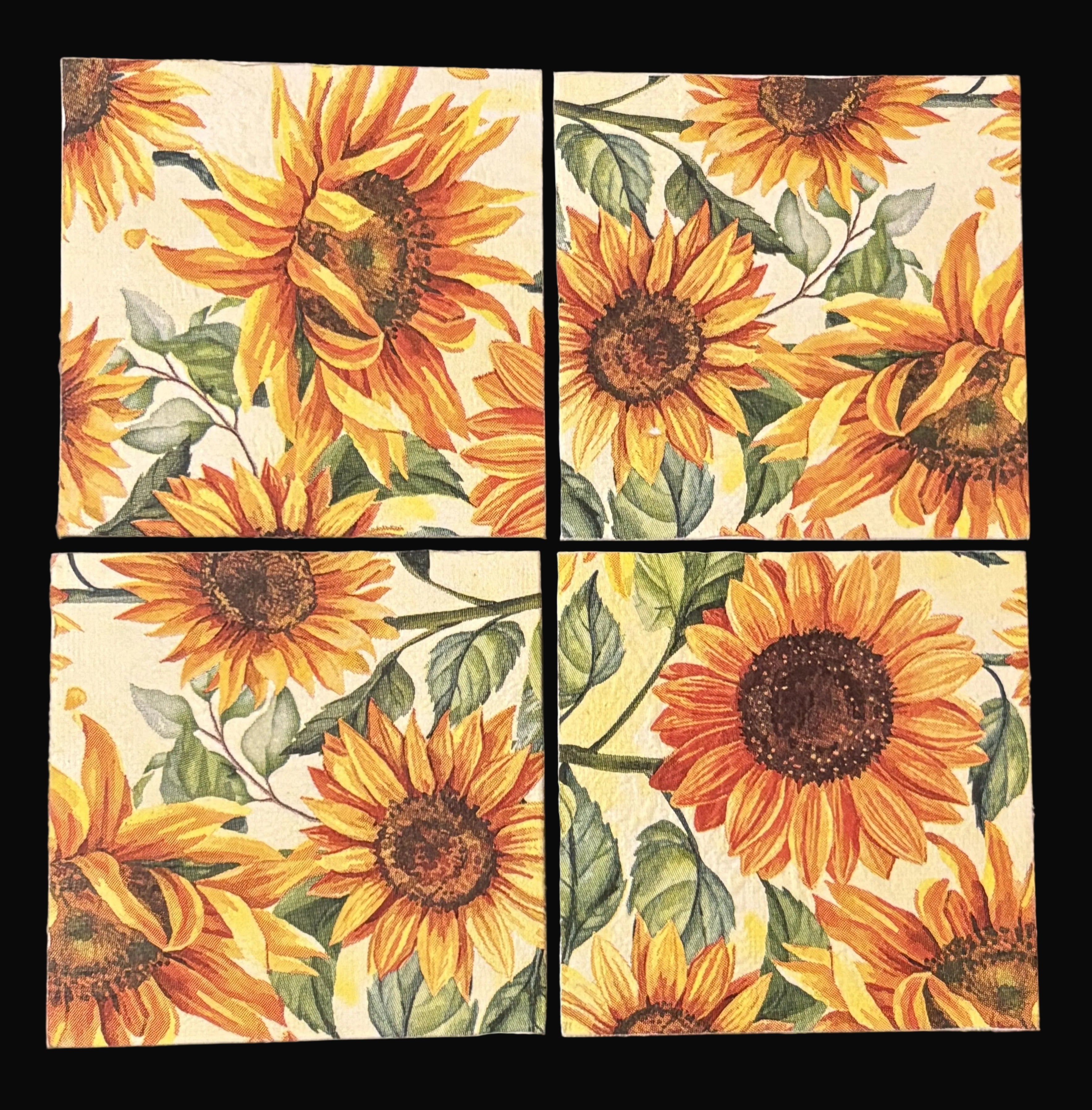 Set of four sunflower magnets with a floral design on a beige background.