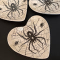 Heart shaped ceramic trinket tray featuring an intricate gothic spider web illustration