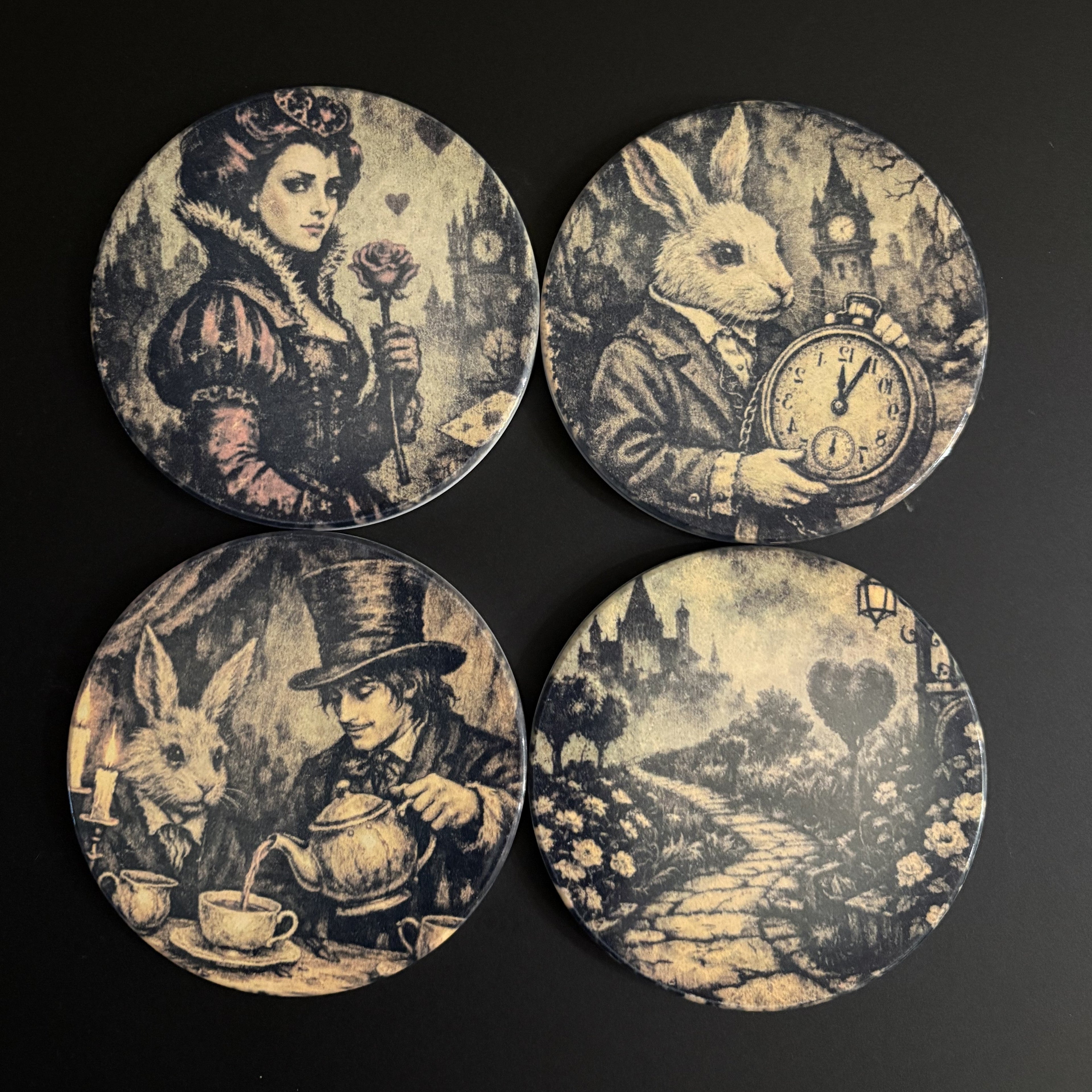Four circular coasters with vintage-themed illustrations on a black background